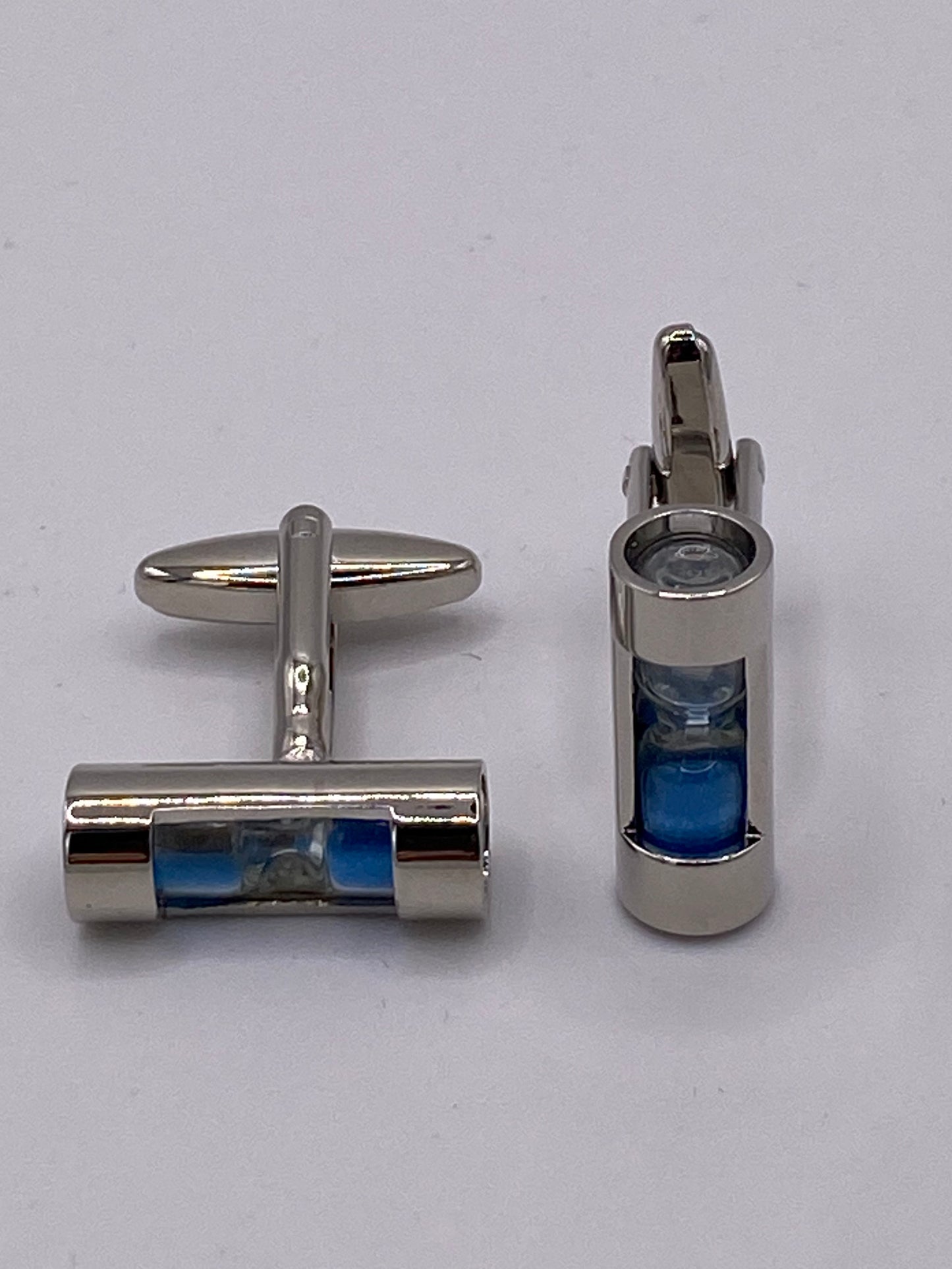 Gemello da polso. CLESSIDRA CON POLVERE AZZURRO 226( capovolgendola la polvere si sposta )