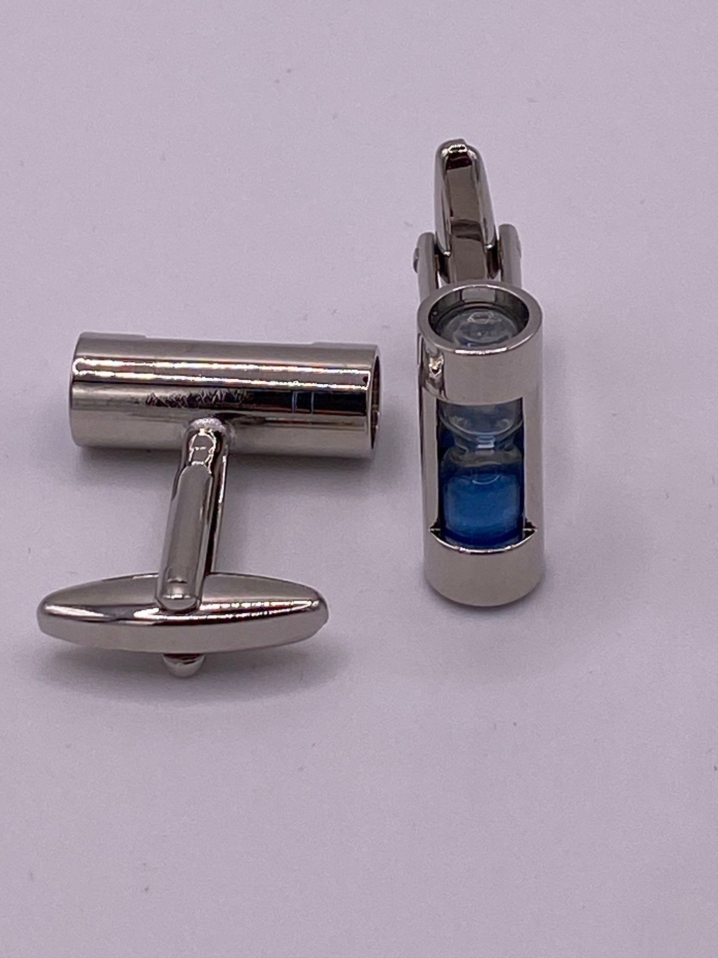 Gemello da polso. CLESSIDRA CON POLVERE AZZURRO 226( capovolgendola la polvere si sposta )